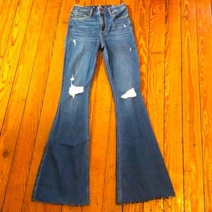 High Rise Flare Jeans by Hollister. Size 0L (W24/L33). NWT.